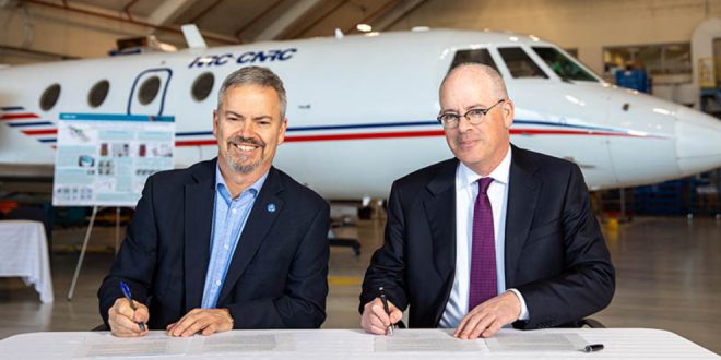 CSA President, Sylvain Laporte (left) and NRC President, Iain Stewart signing the memorandum of understanding