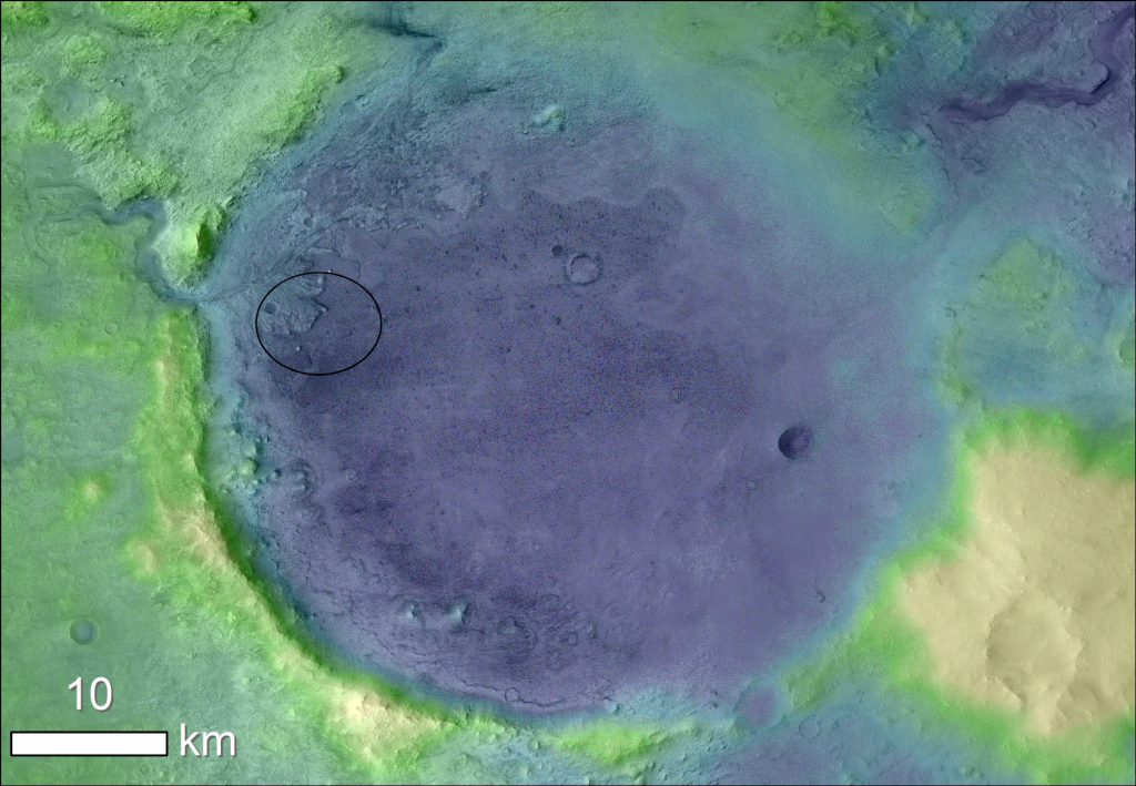 Lighter colors represent higher elevation in this image of Jezero Crater on Mars, the landing site for NASA's Mars 2020 mission. The oval indicates the landing ellipse, where the rover will be touching down on Mars. The color added to this image helps the crater rim stand out clearly, and makes it easier to spot the shoreline of a lake that dried up billions of years ago