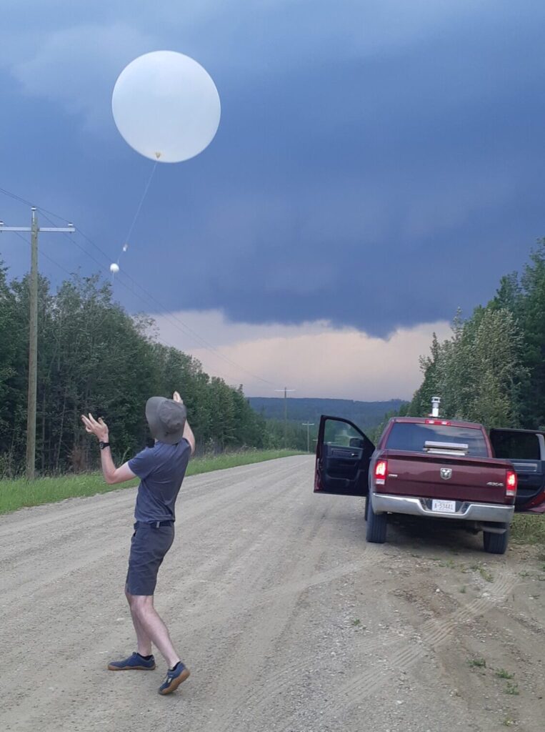 Joshua Soderholm releases a hailsonde into the approach supercell’s inflow region. Image credit: Joshua Soderholm/Western University.